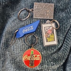 Coca-Cola Keychain Collection with Red and Blue Accents